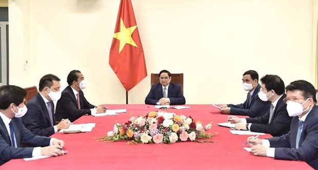 政府总理范明正希望比利时早日向越南提供疫苗